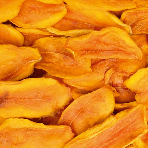 Morceaux de mangue séchée bio aux couleurs tropicales